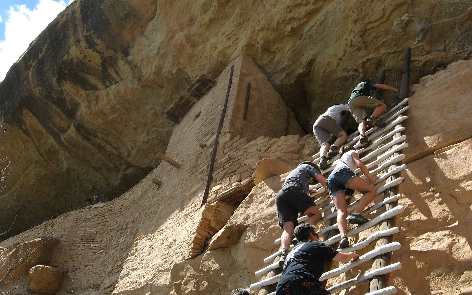 The ladder into Balcony House — 40 rooms reached by ladder and a tunnel crawl, NPS.